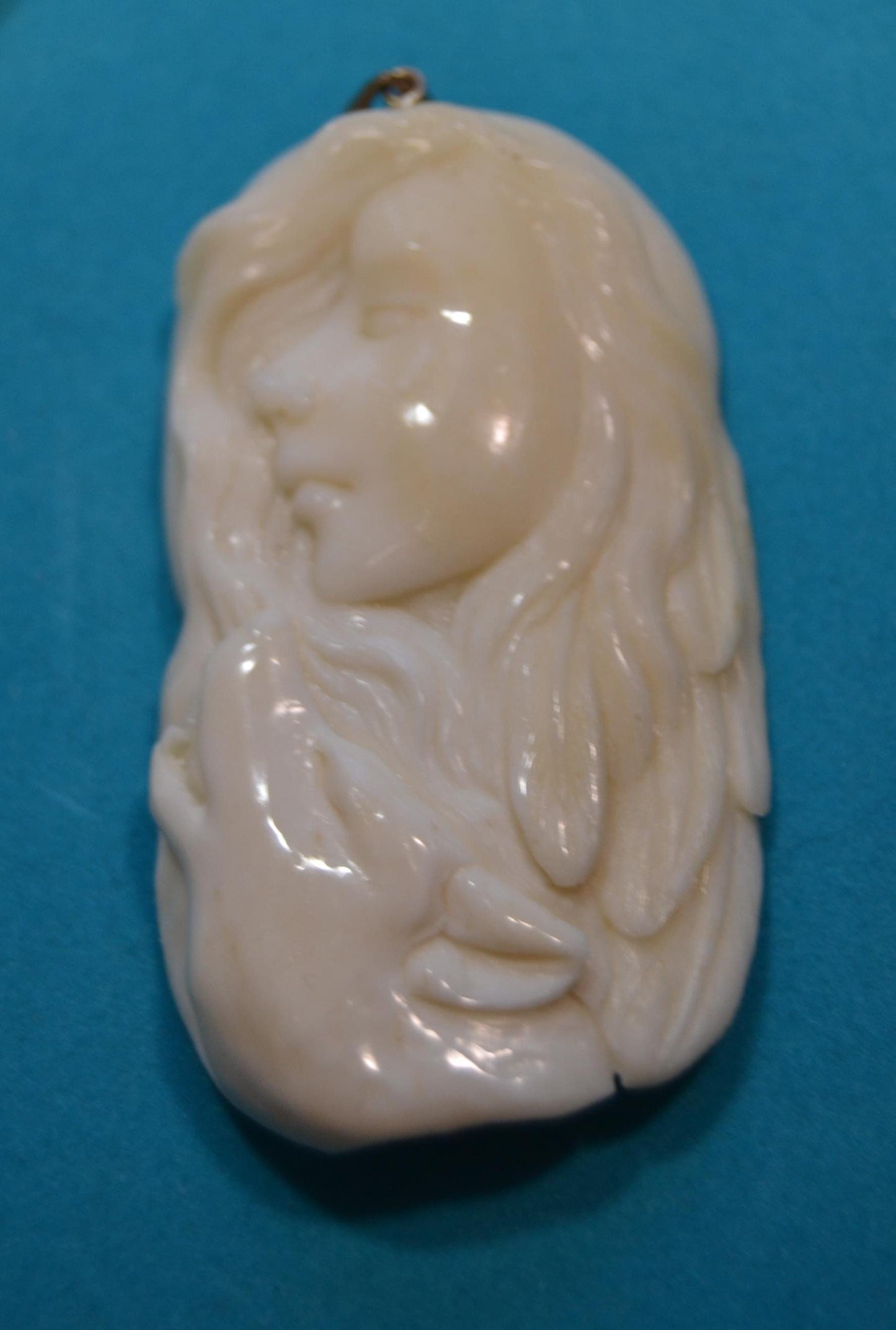 Carved bone pendants Wolf, buffalo shaman, woman w/dear,