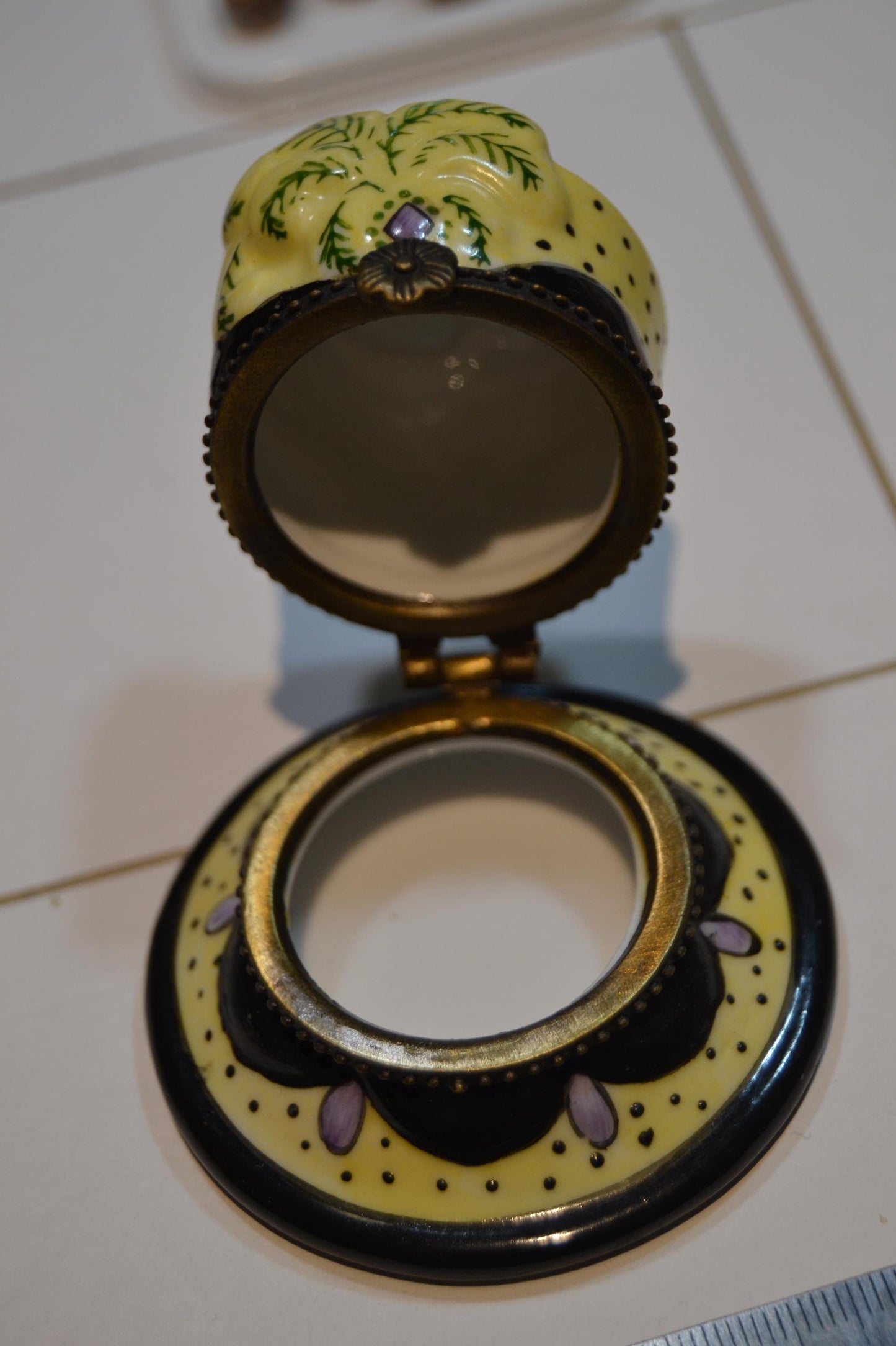 Cute enameled hat box.