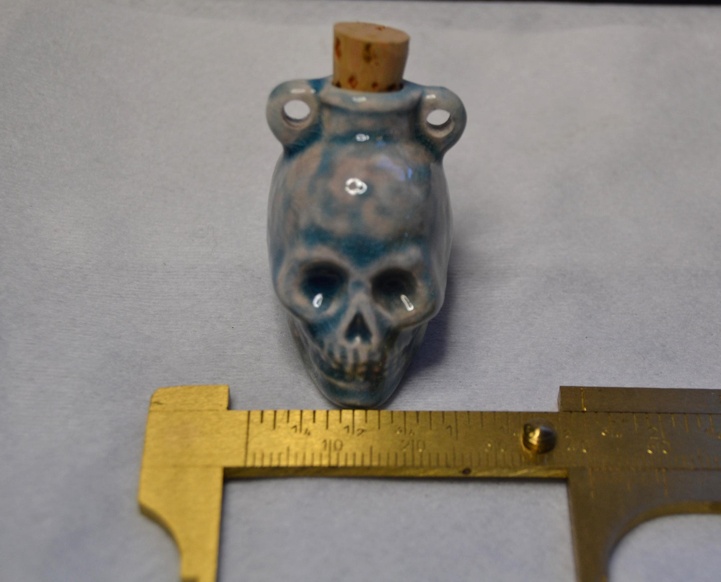Skull potion bottle/vessel pendant