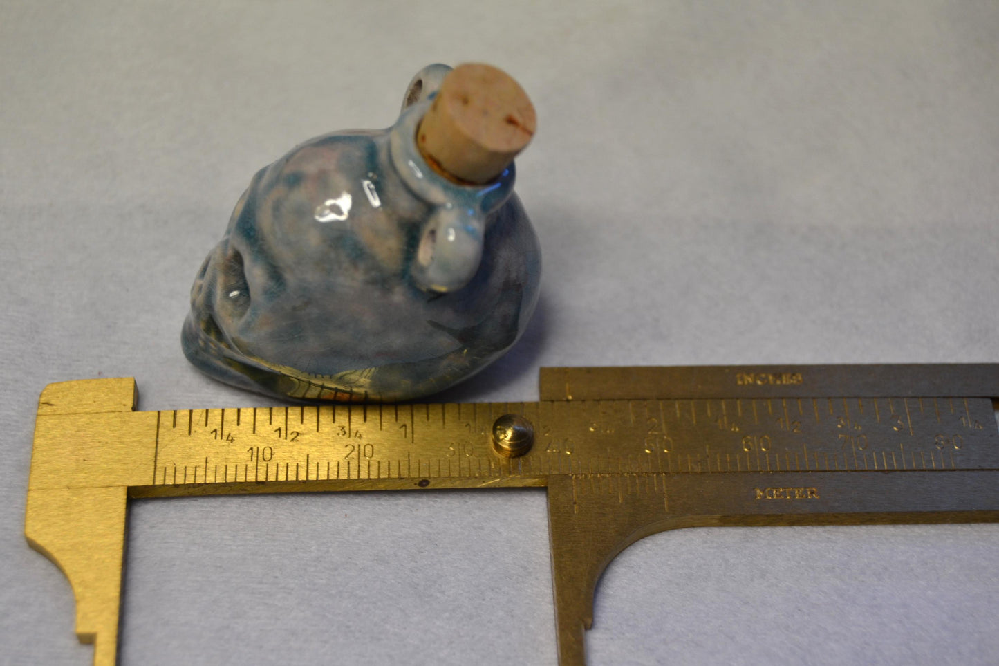 Skull potion bottle/vessel pendant