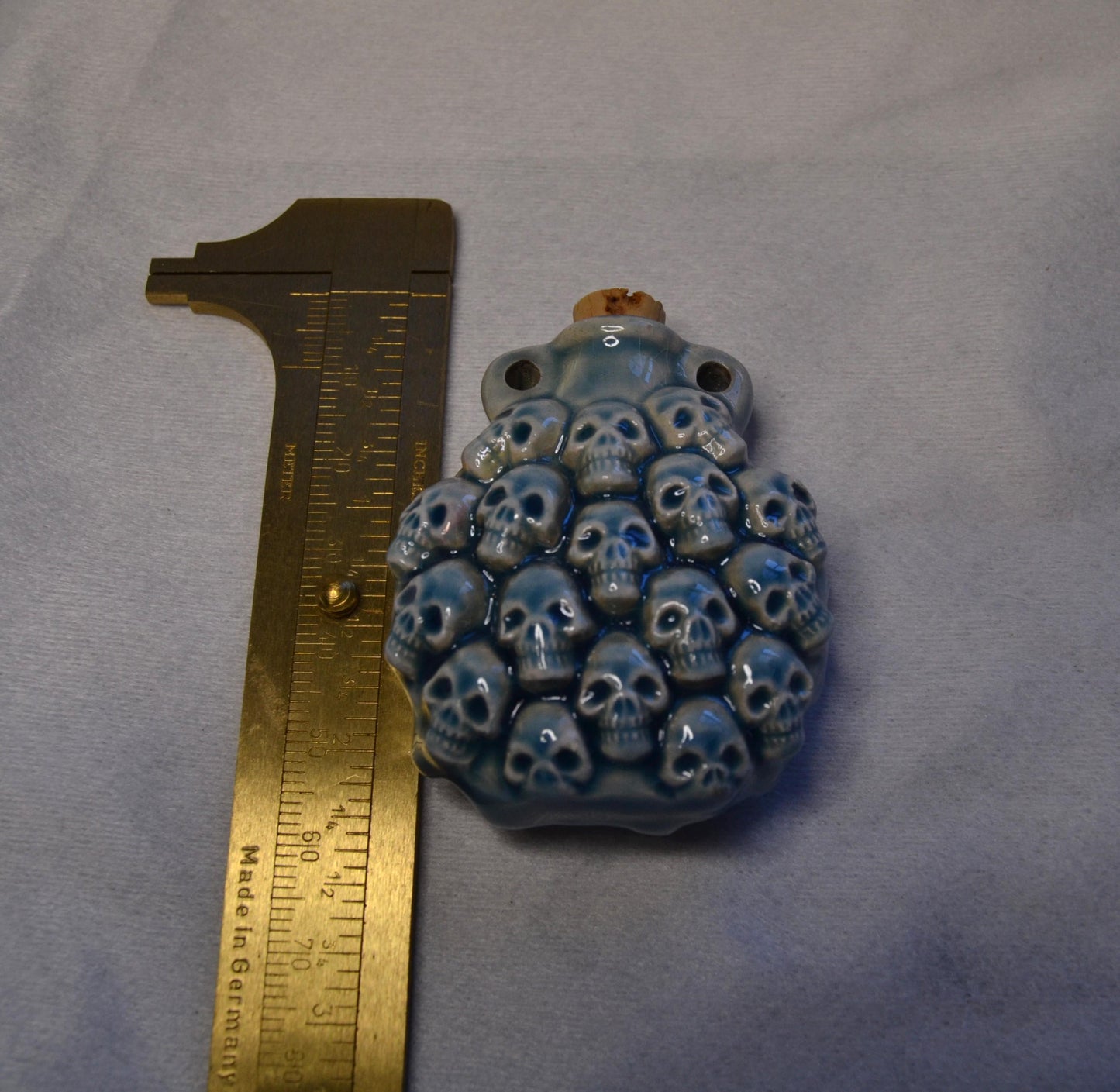 Skull potion bottle/vessel pendant