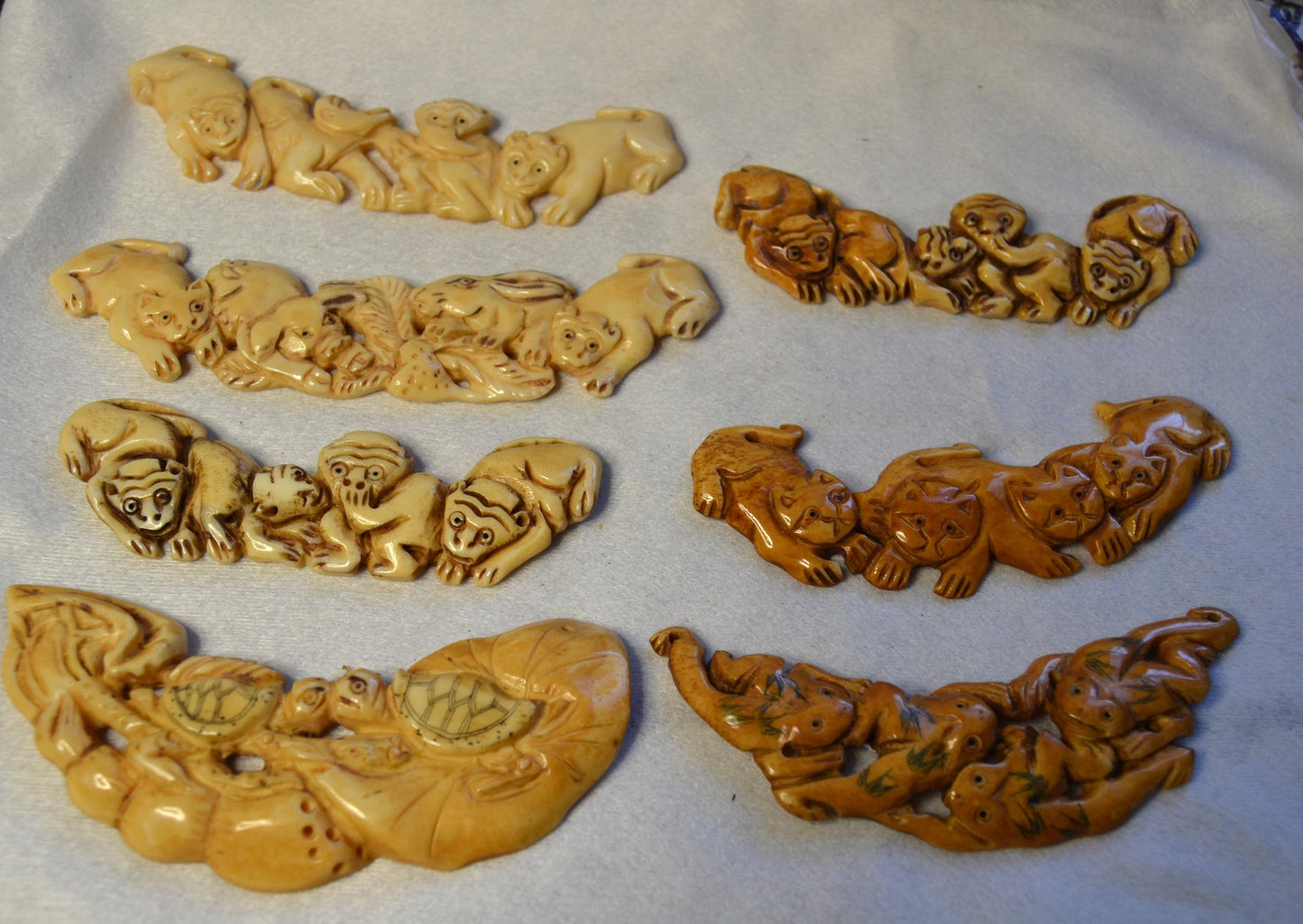 Hand Carved Bone,  link pendants