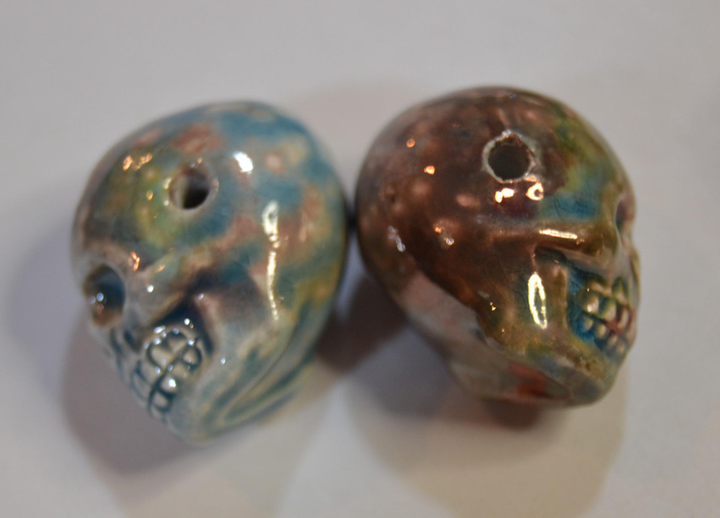 Peruvian Skull bead, glazed sold in pairs