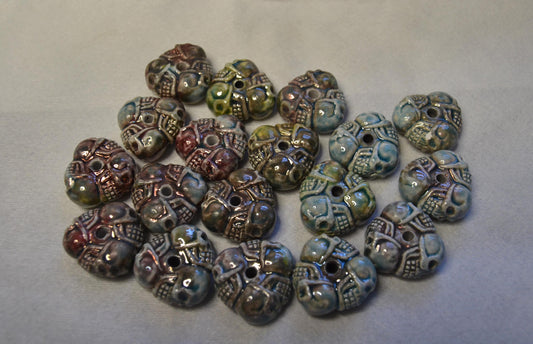 Tri-Skull Peruvian porcelain beads, raku or Bisque finish