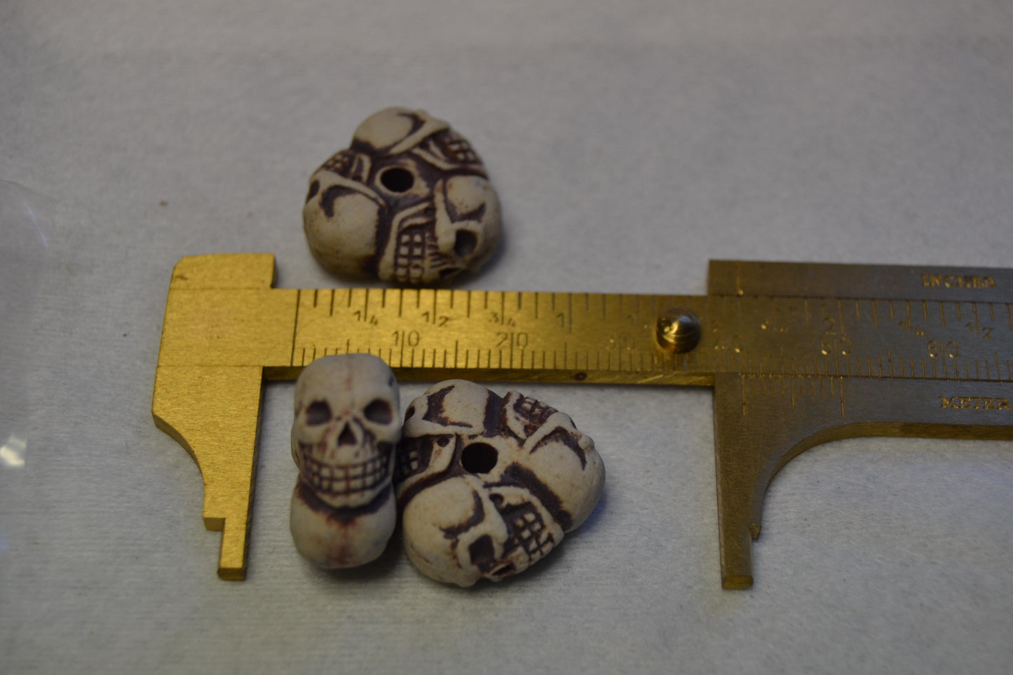 Tri-Skull Peruvian porcelain beads, raku or Bisque finish