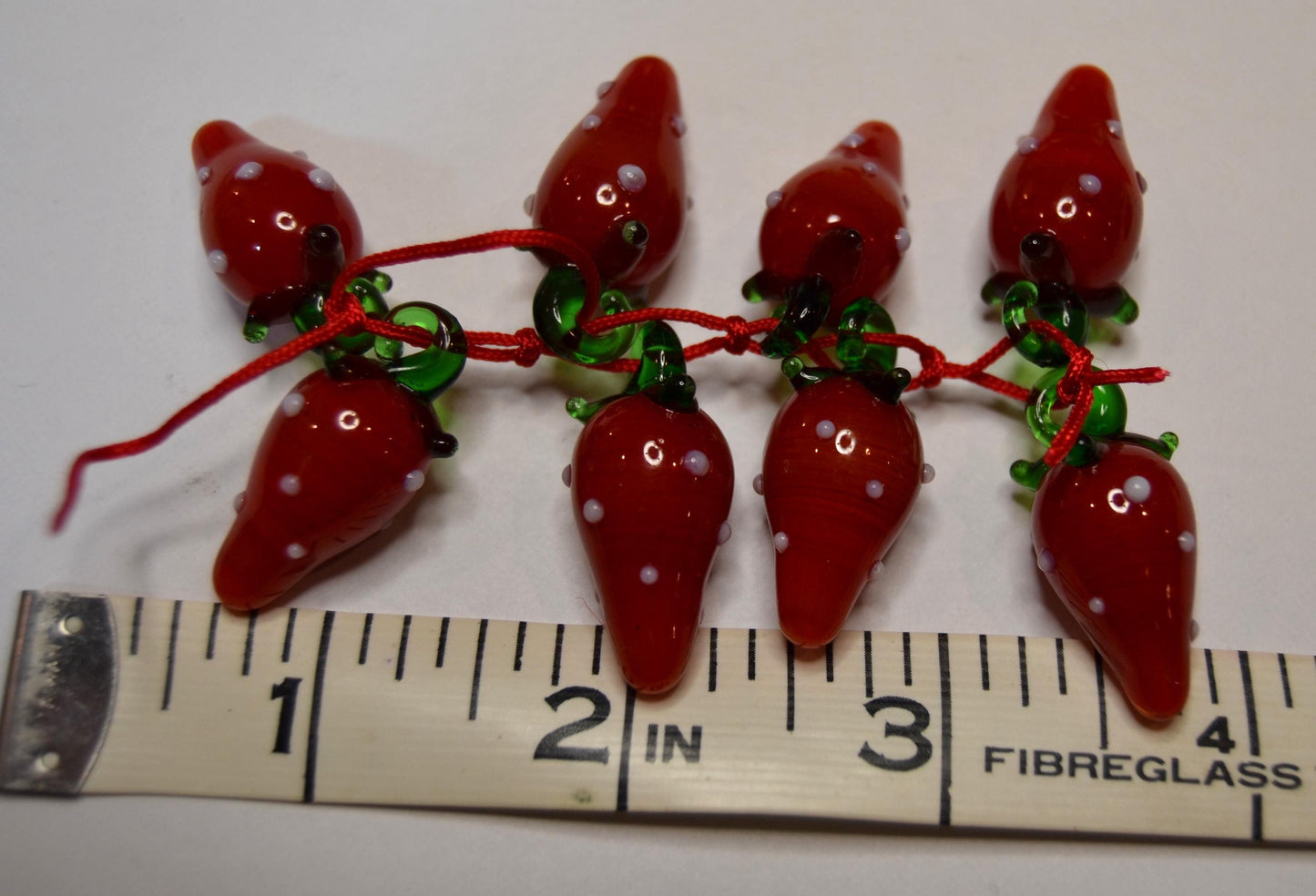 Glass food beads, Garlic, cherries, and strawberries