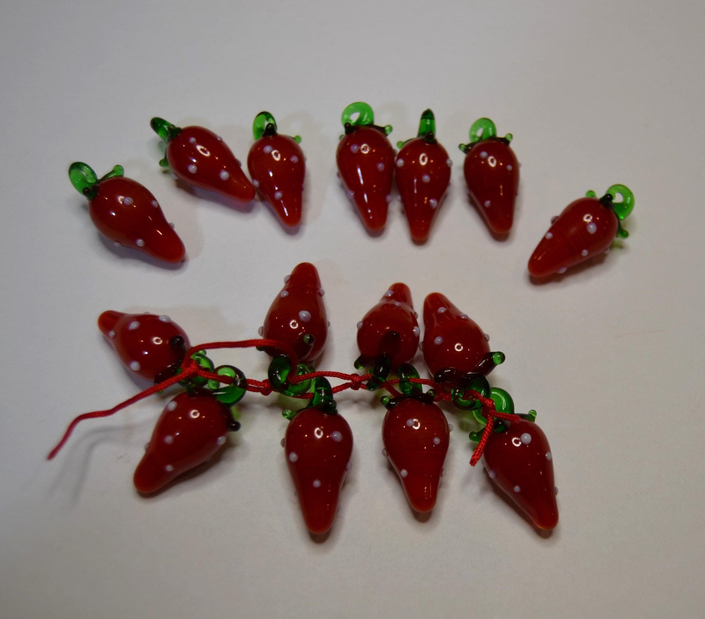 Glass food beads, Garlic, cherries, and strawberries