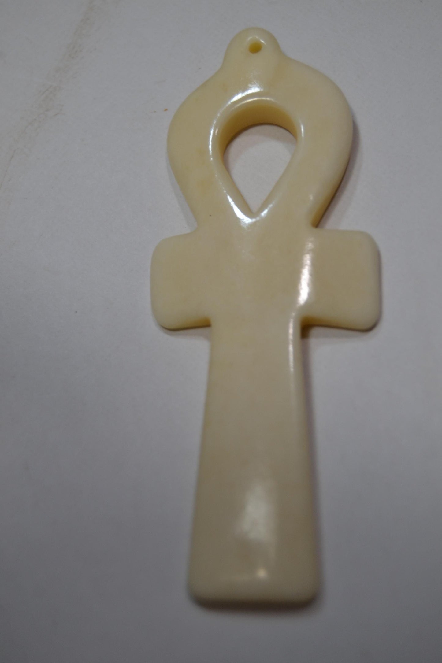 Hand carved bone, spiritual pendants