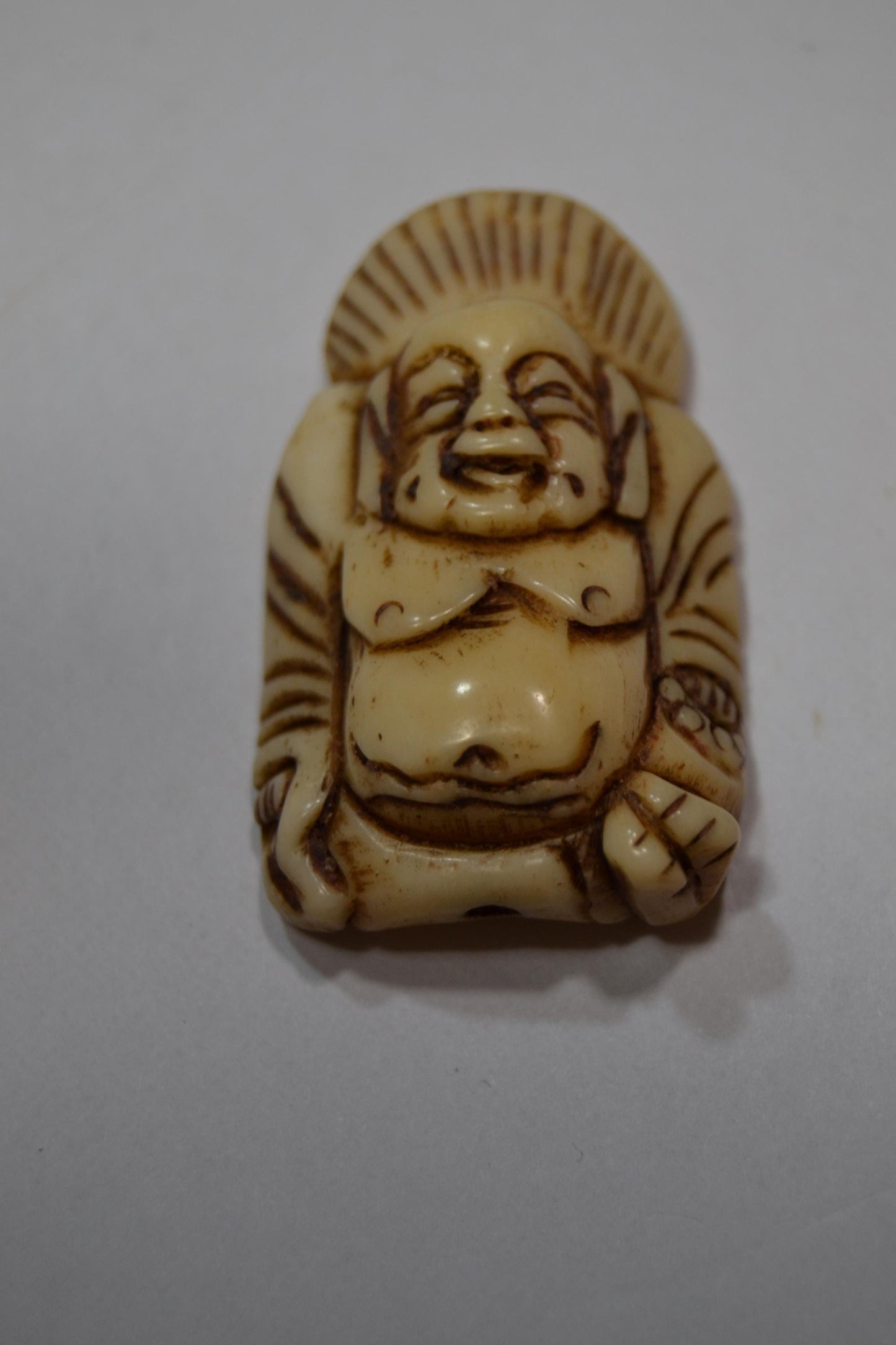 Hand carved bone, spiritual pendants