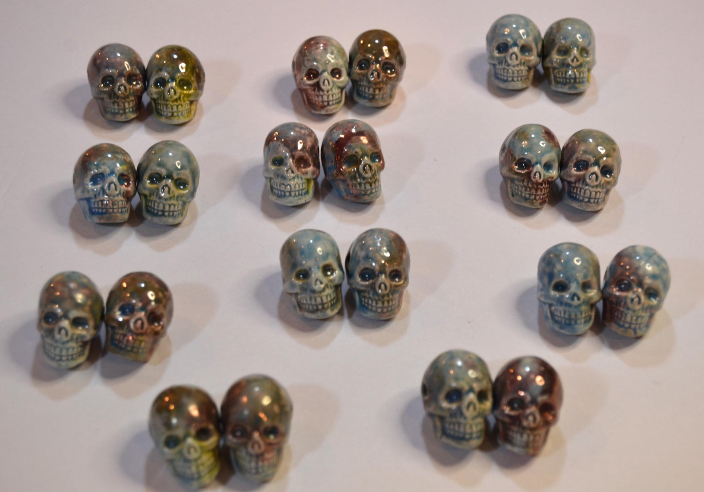 Peruvian Skull bead, glazed sold in pairs