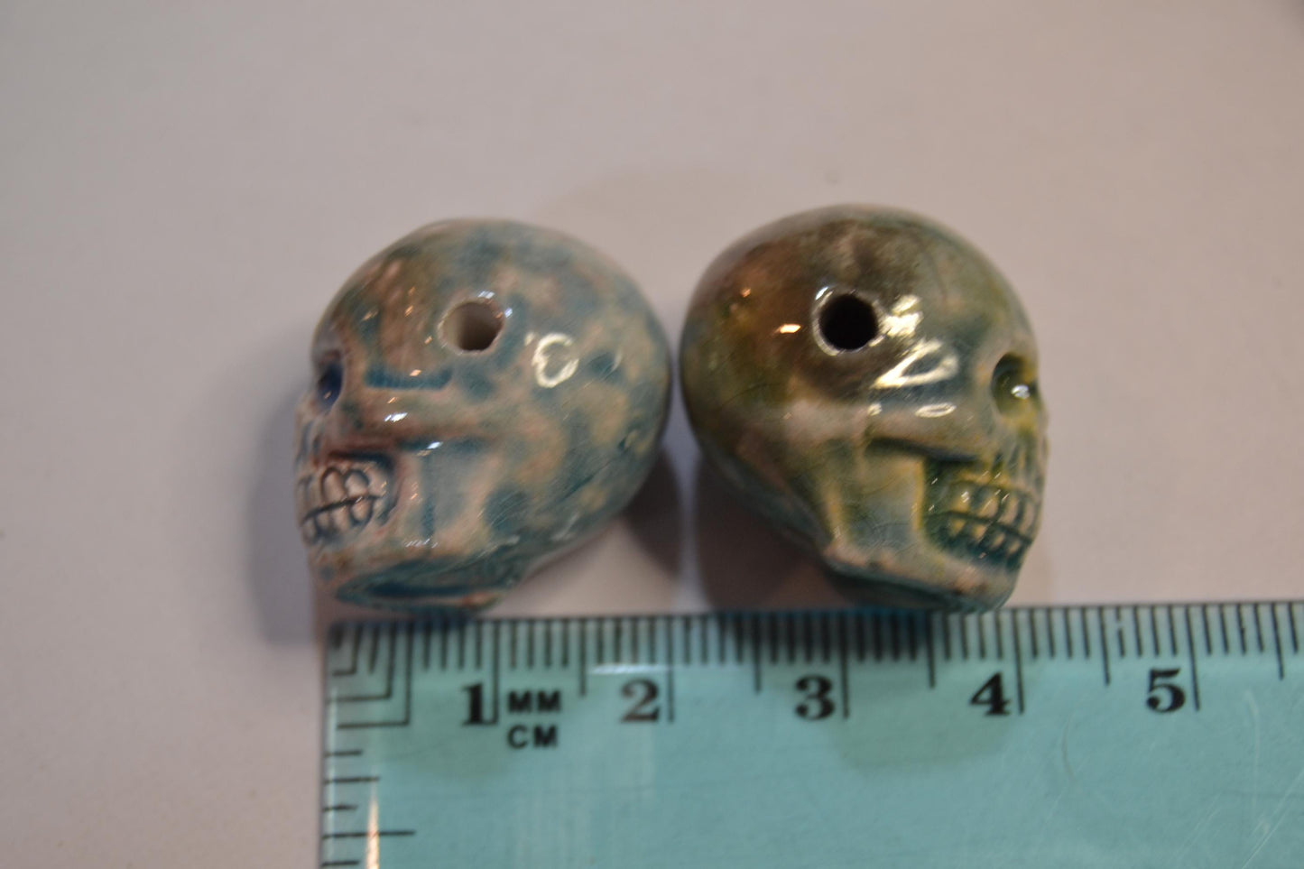 Peruvian Skull bead, glazed sold in pairs