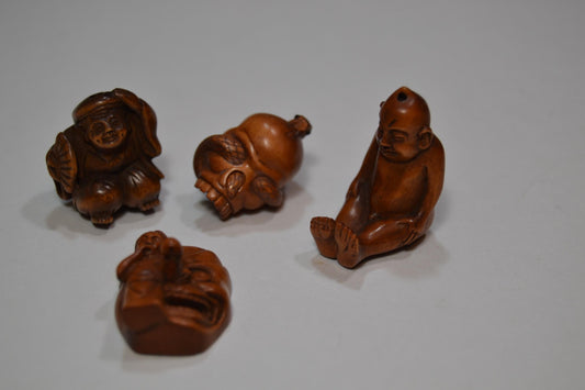 Ojime, figurines, skull  and mask