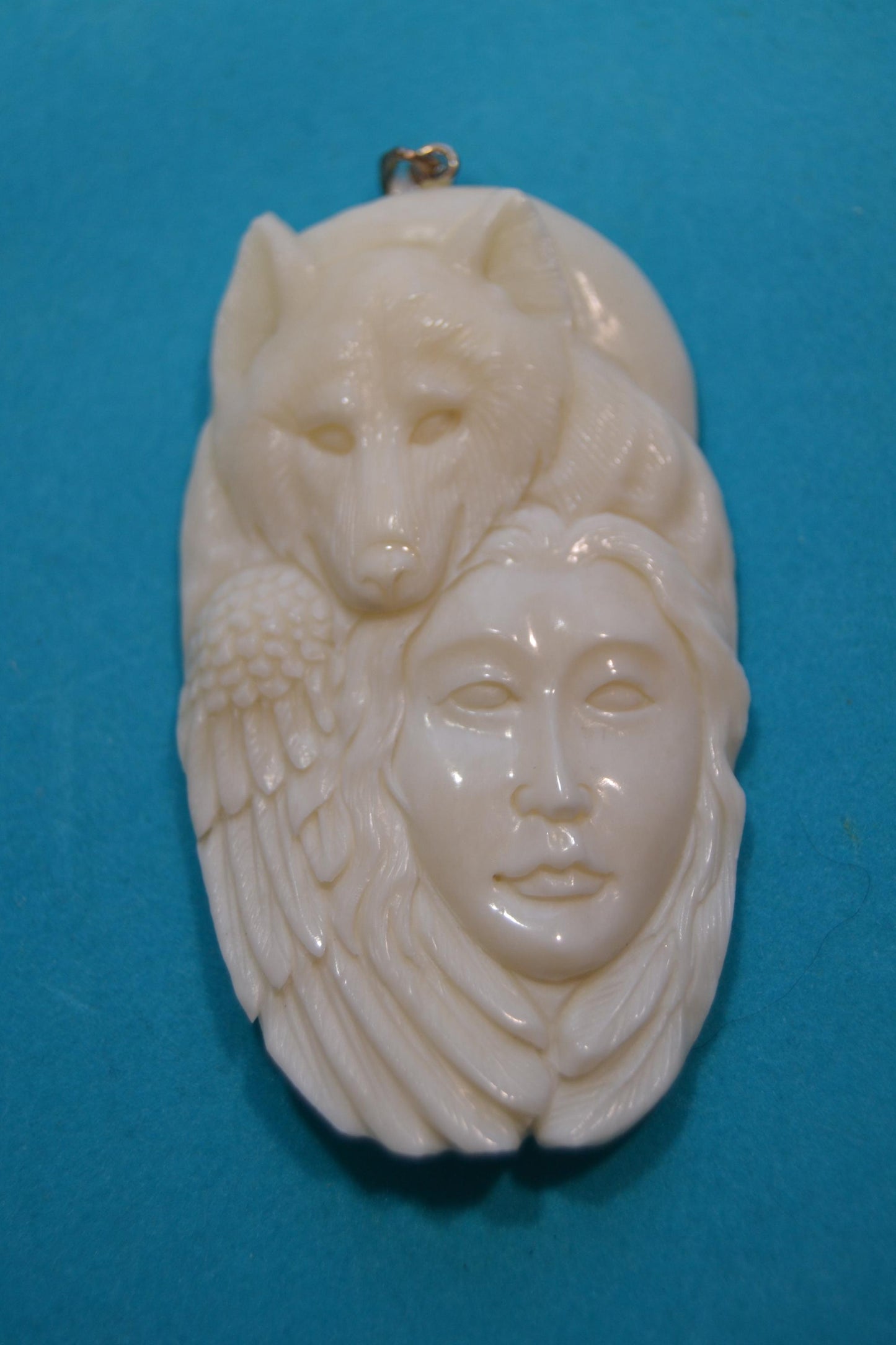 Carved bone pendants Wolf, buffalo shaman, woman w/dear,