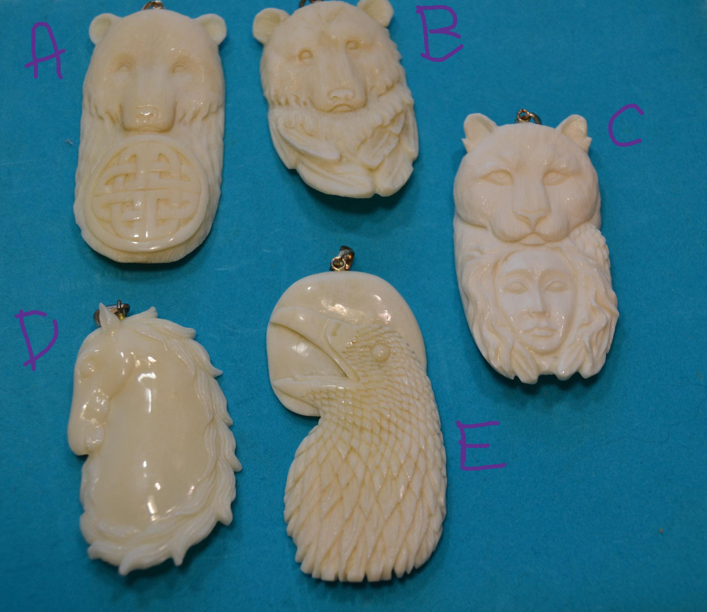 Hand carved bone pendants bears, horse head, eagle w/moon,