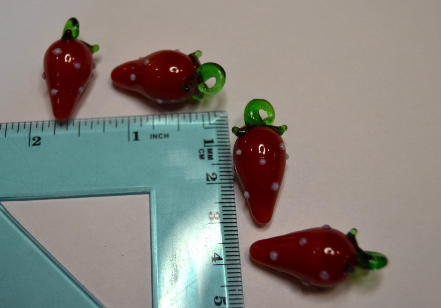 Glass food beads, Garlic, cherries, and strawberries