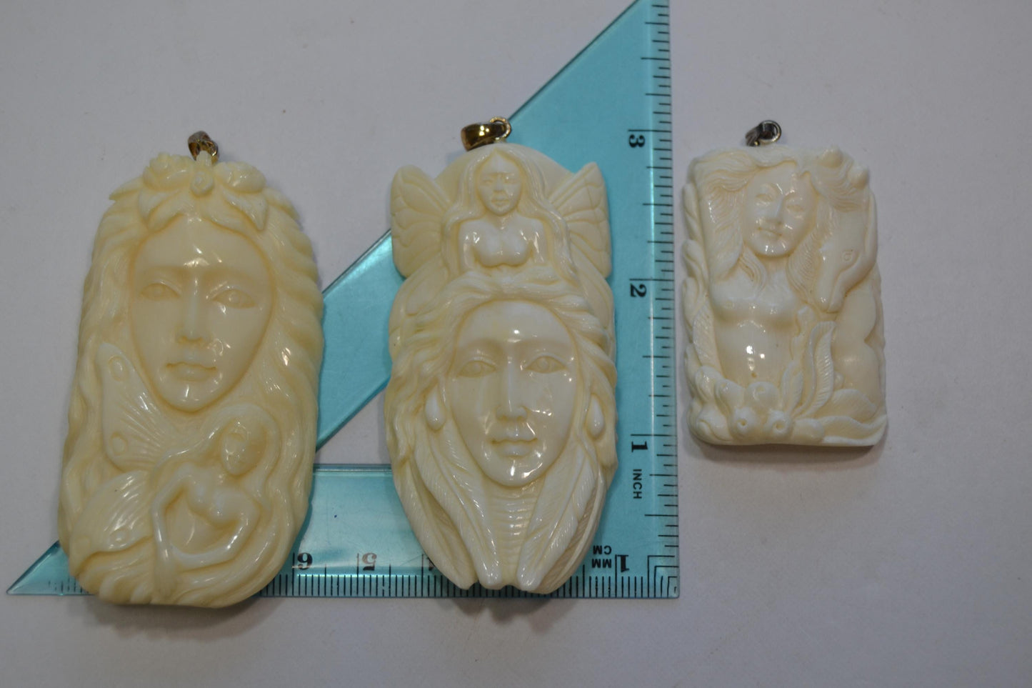 Hand-Carved Fairy/Face Pendants
