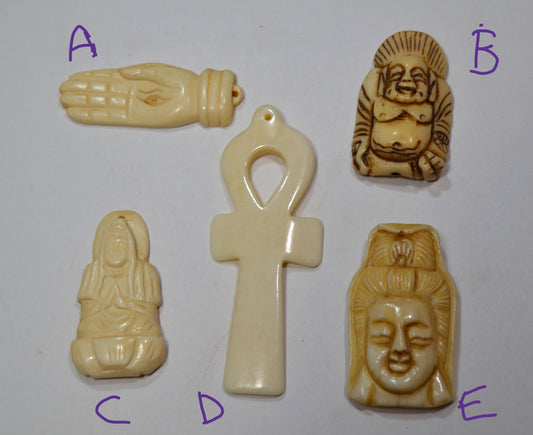 Hand carved bone, spiritual pendants