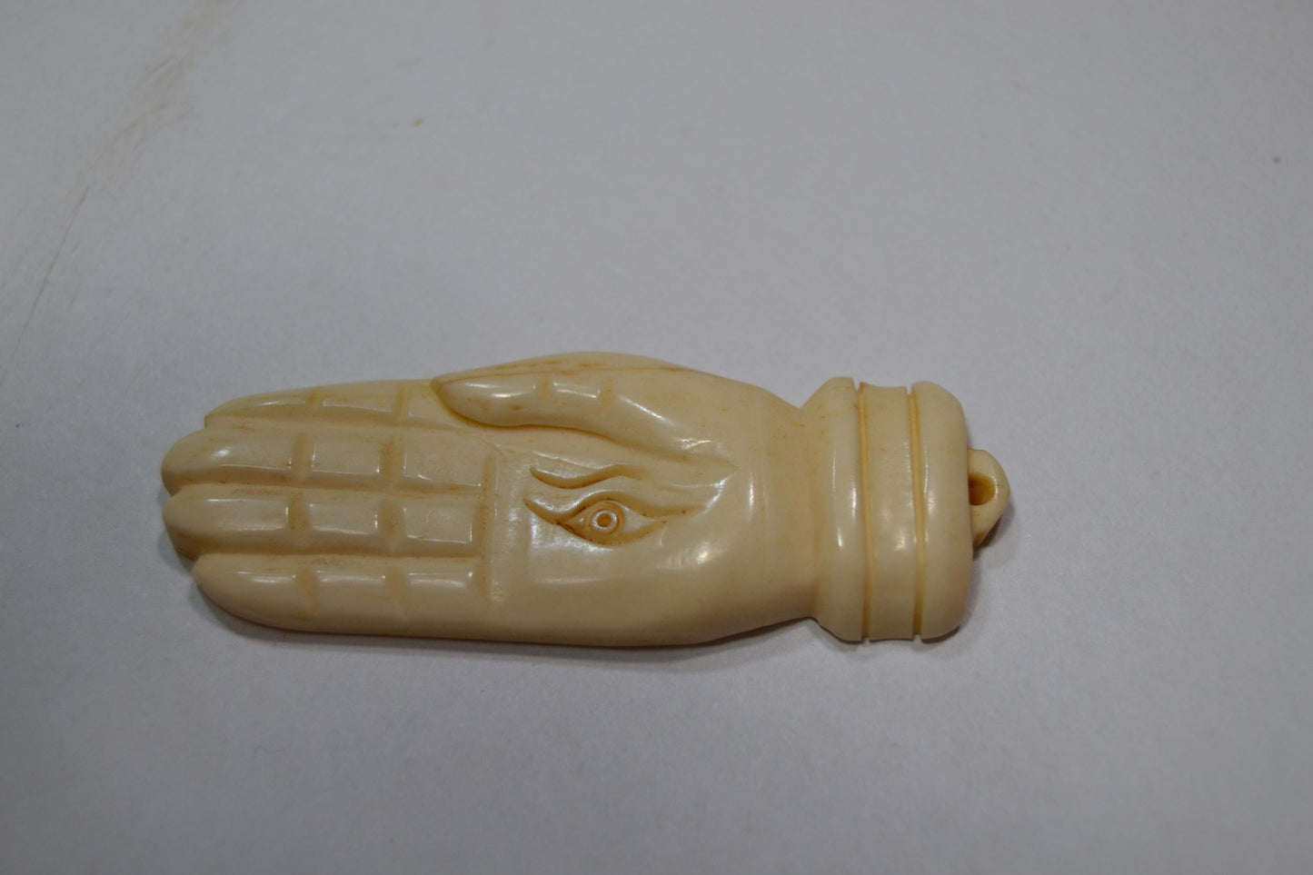 Hand carved bone, spiritual pendants