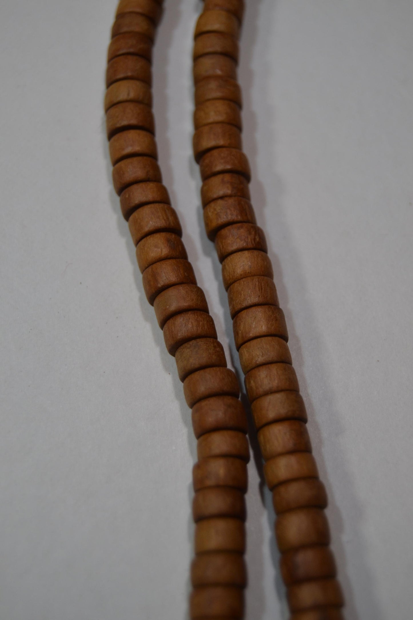 Horn and wood bead strands