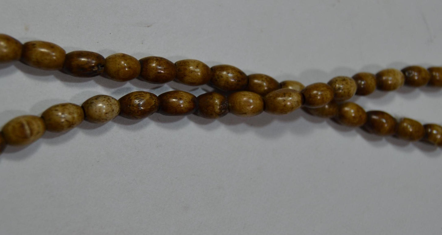 Horn and wood bead strands