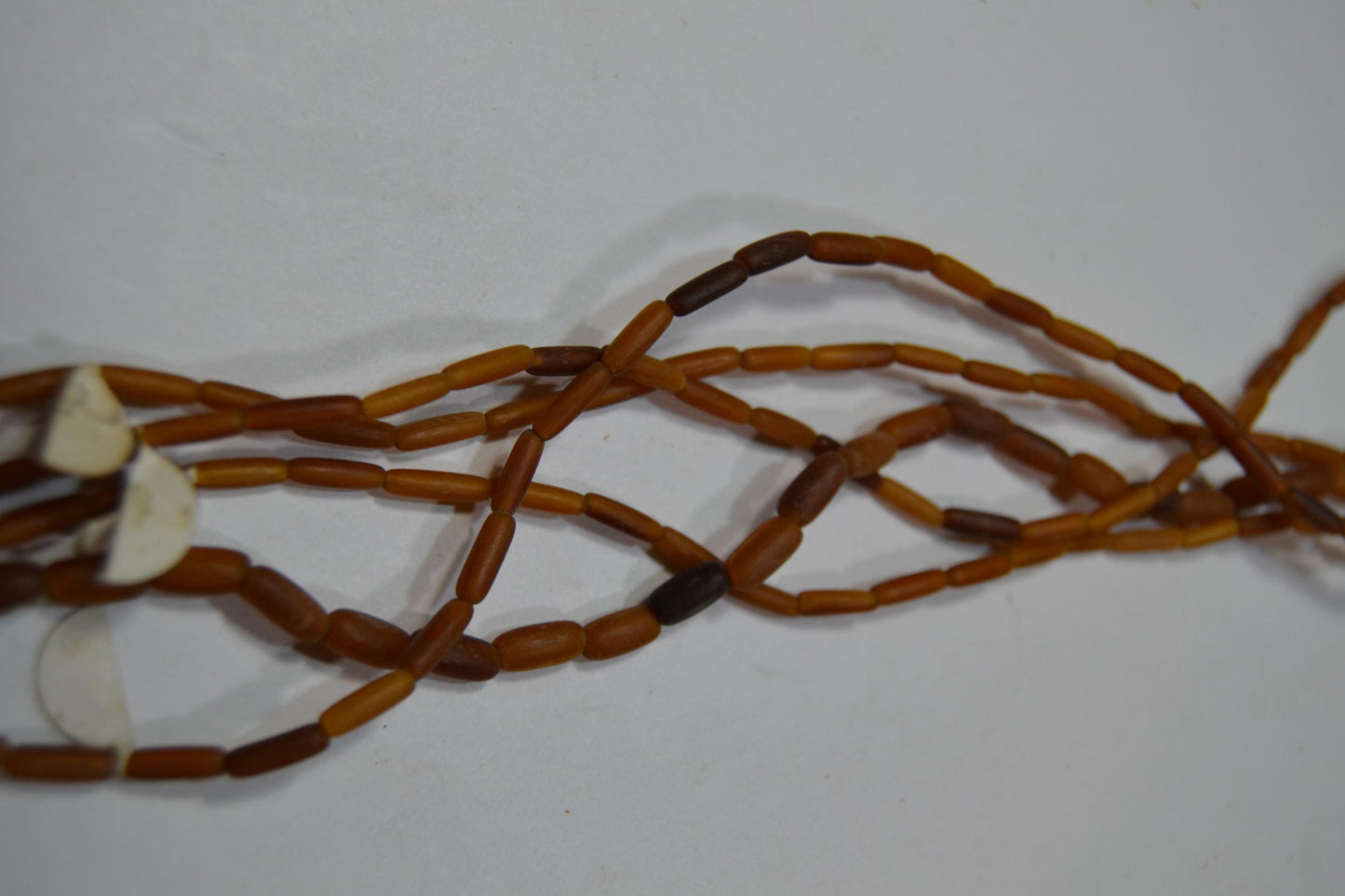 Horn and wood bead strands