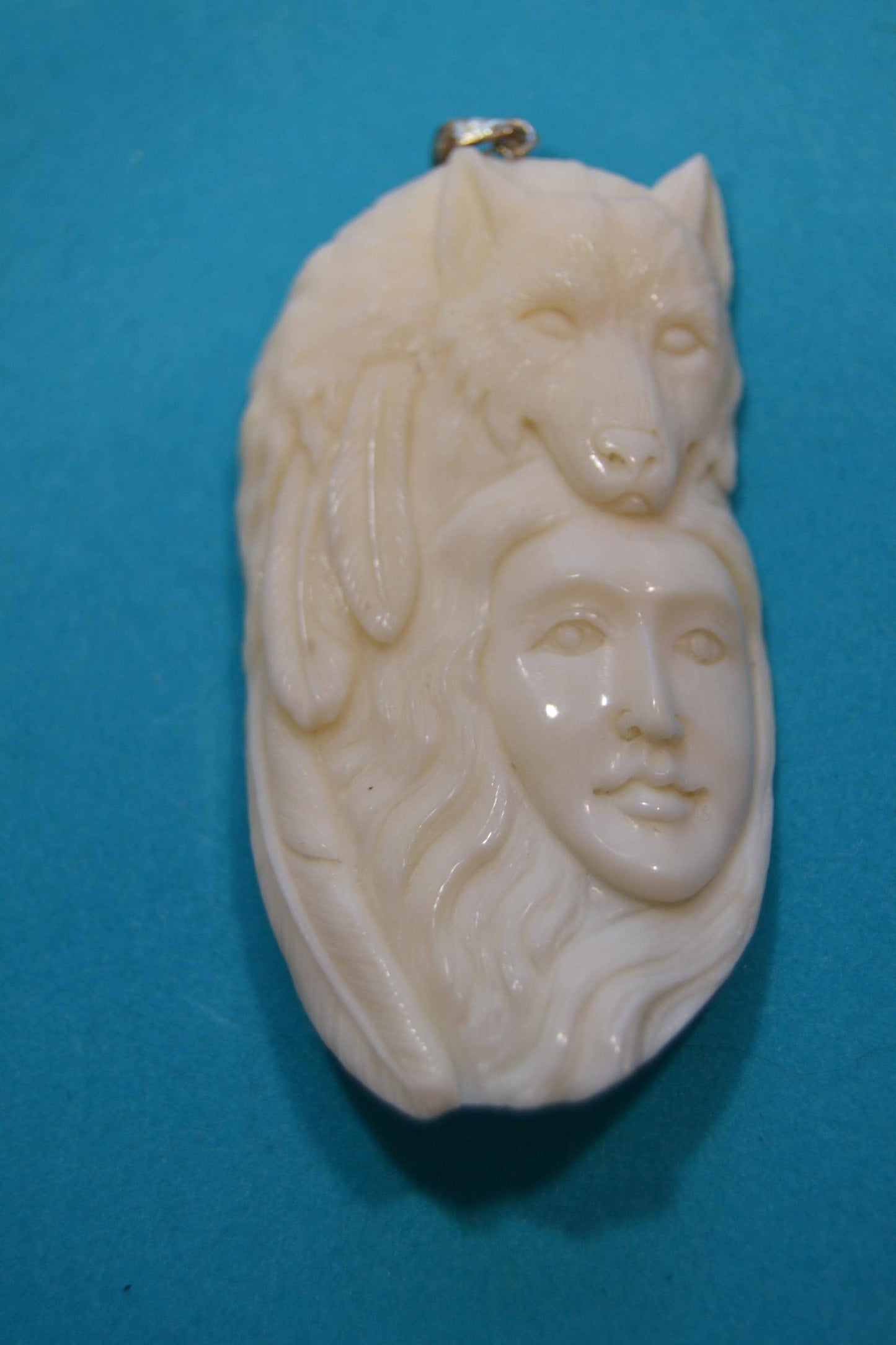 Carved bone pendants Wolf, buffalo shaman, woman w/dear,