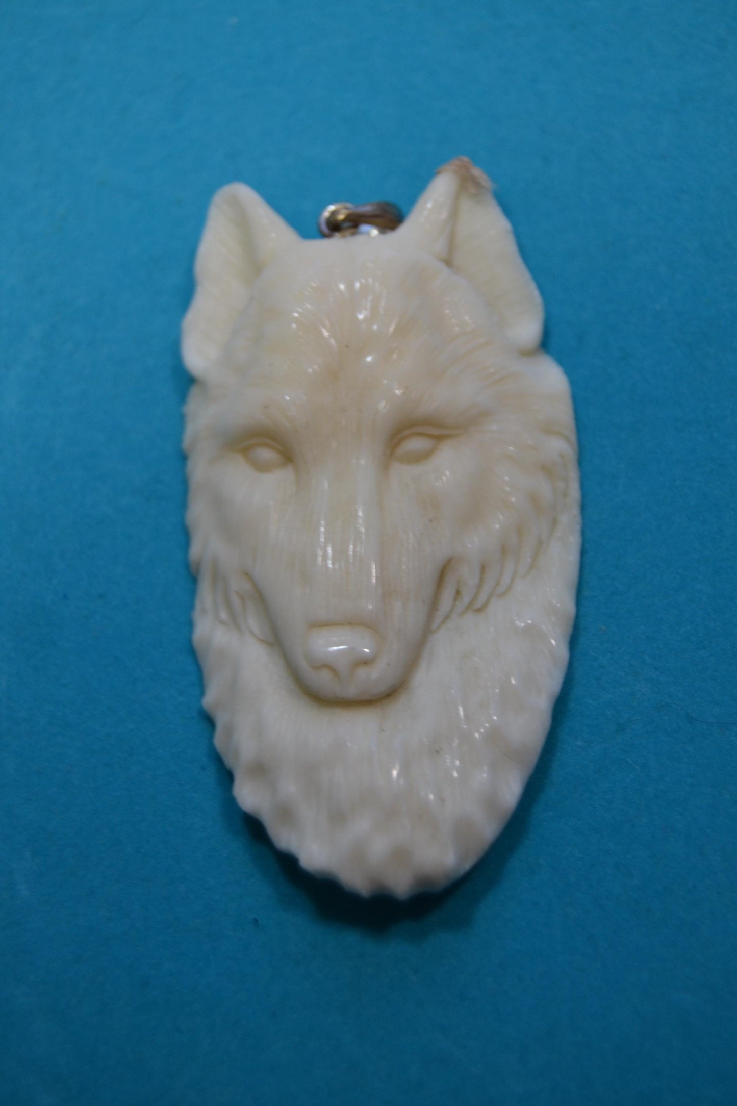 Carved bone pendants Wolf, buffalo shaman, woman w/dear,