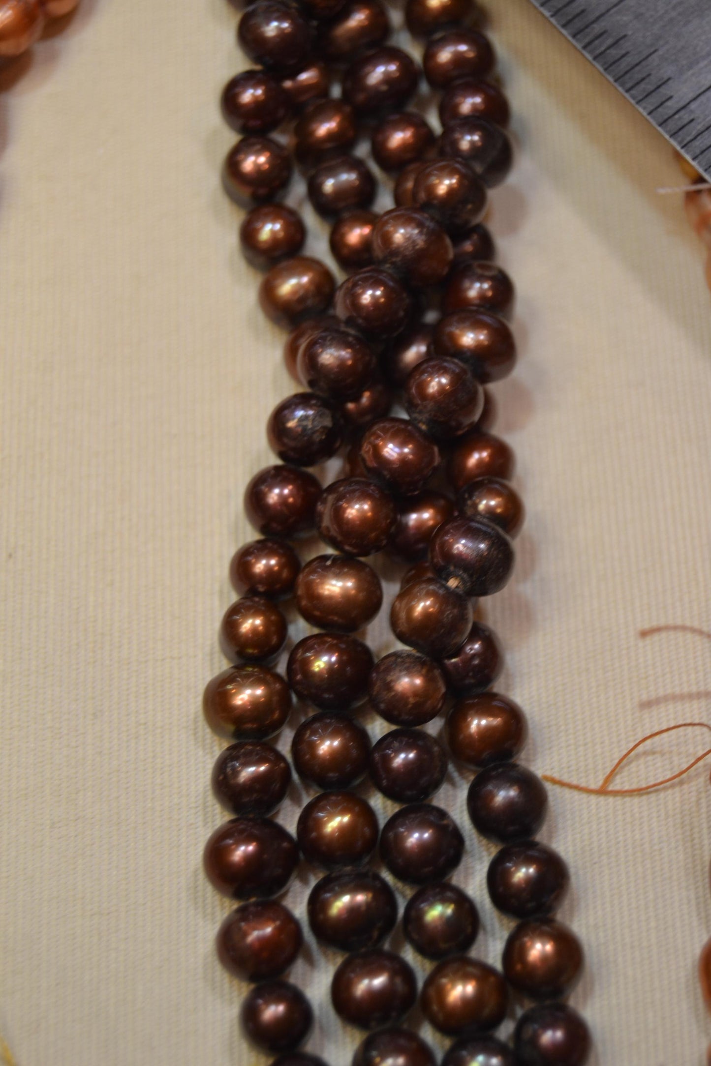 Freshwater pearls, warm tones, 7-8 mm string length