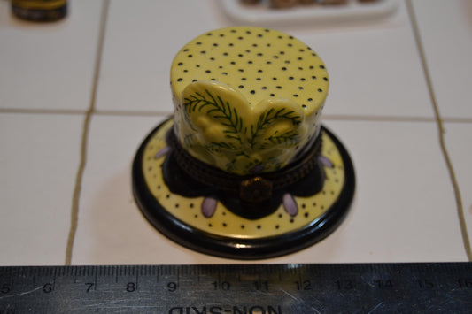 Cute enameled hat box.