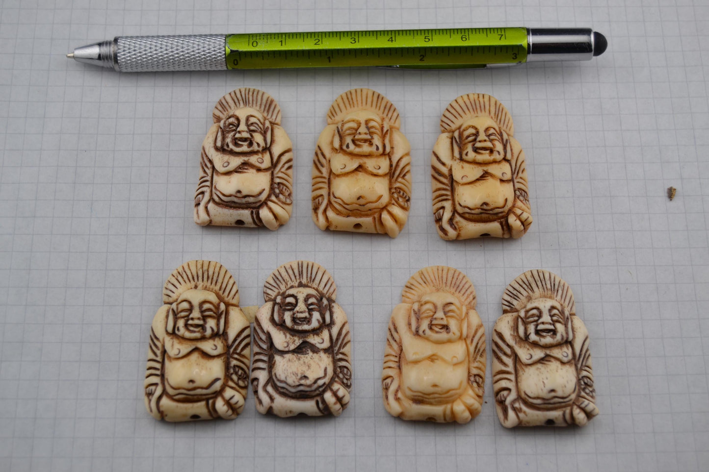 Bone goddess, deity and luck carved bone pendants