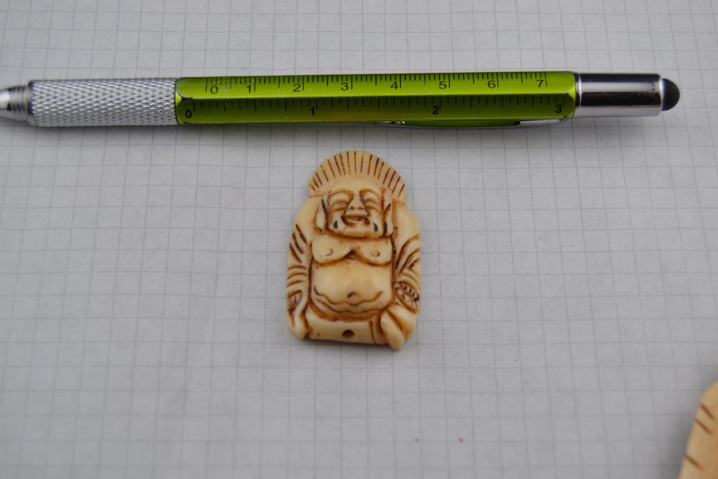 Bone goddess, deity and luck carved bone pendants