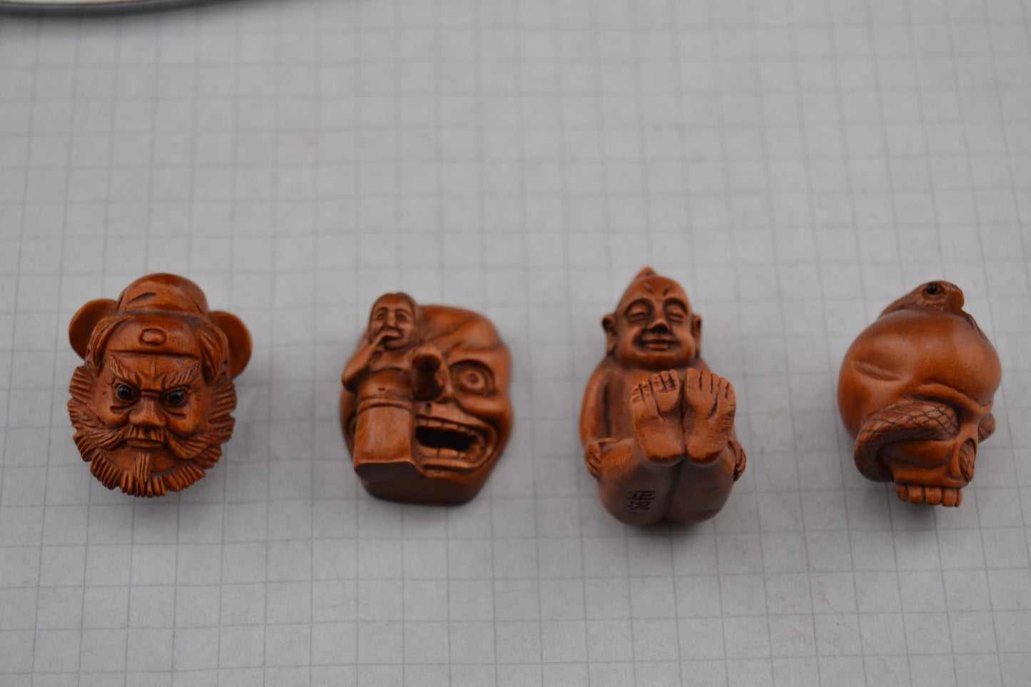 Ojime, figurines, skull  and mask