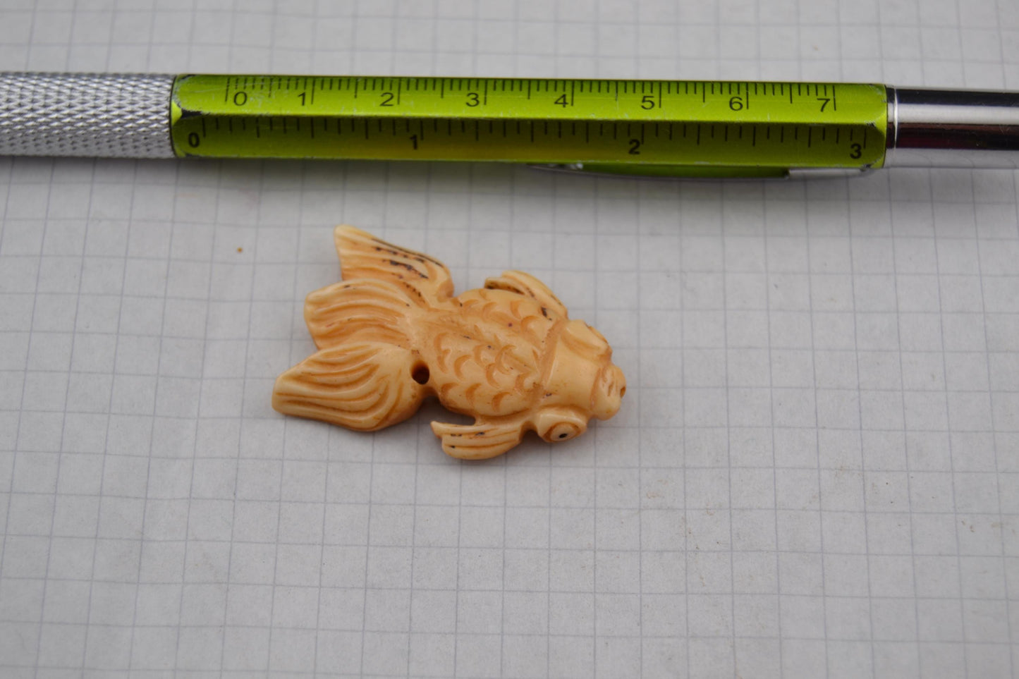 Hand-carved animal beads from bone