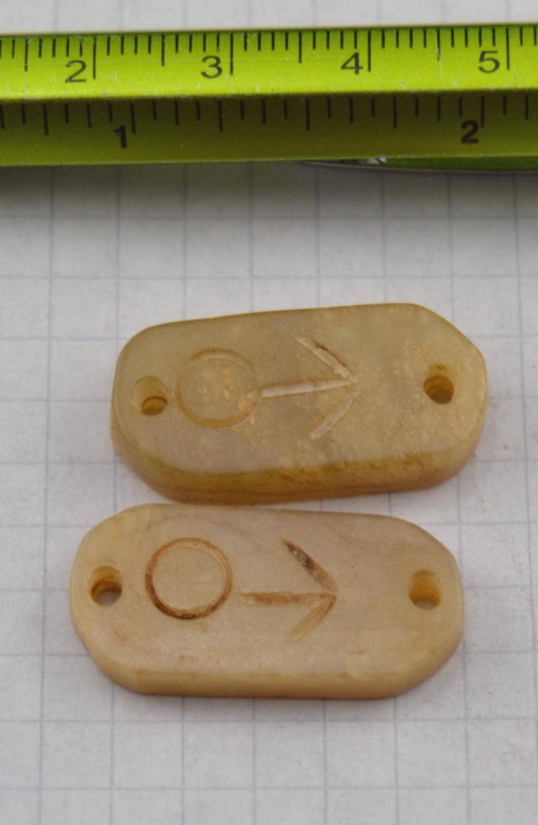 Asian symbols on carved jade links