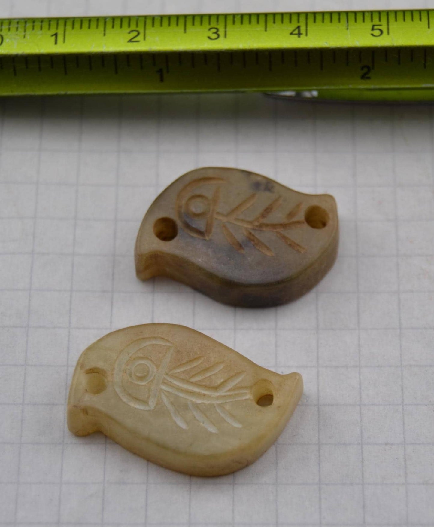 Asian symbols on carved jade links