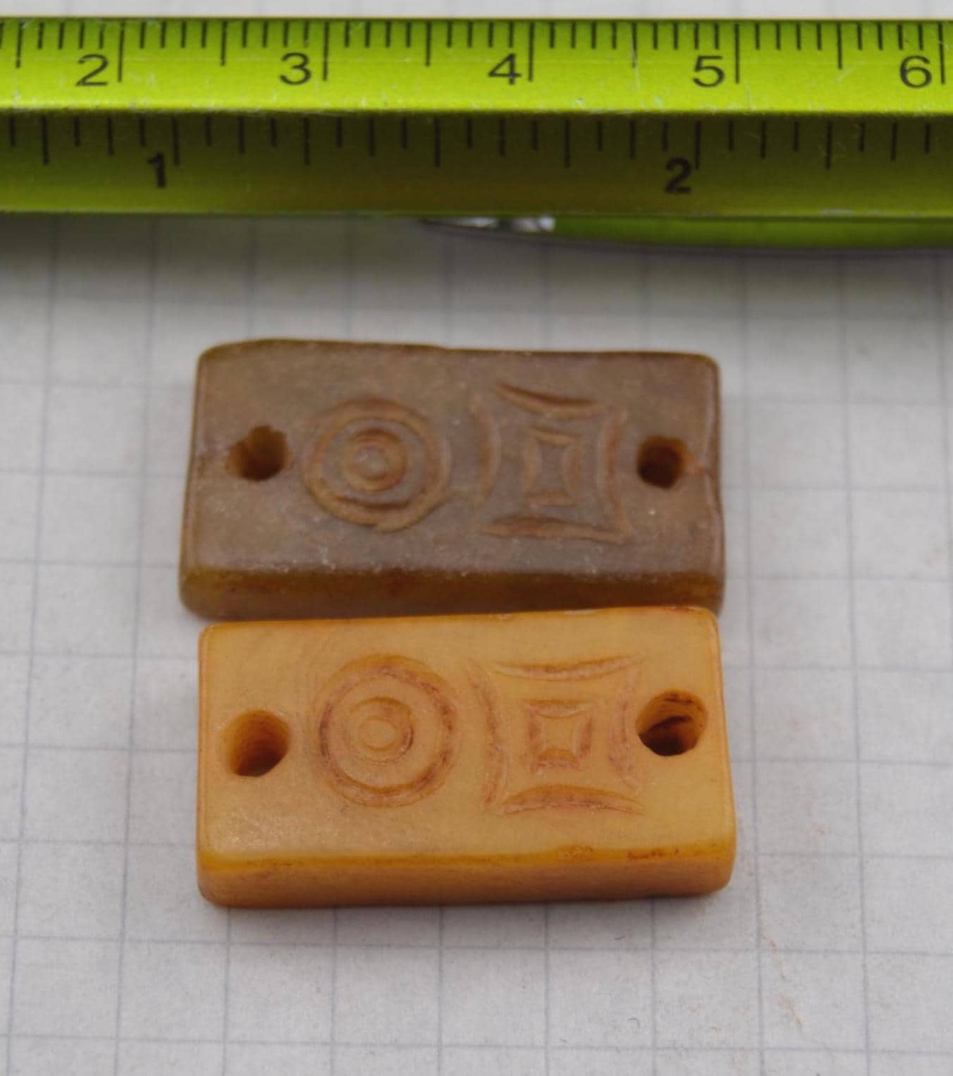 Asian symbols on carved jade links